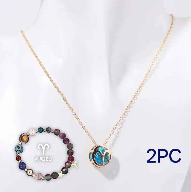 Natural stone beaded necklace and bracelet set laid out flat, showing the coordinated design and textured beads.