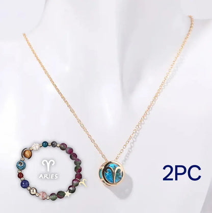Natural stone beaded necklace and bracelet set laid out flat, showing the coordinated design and textured beads.