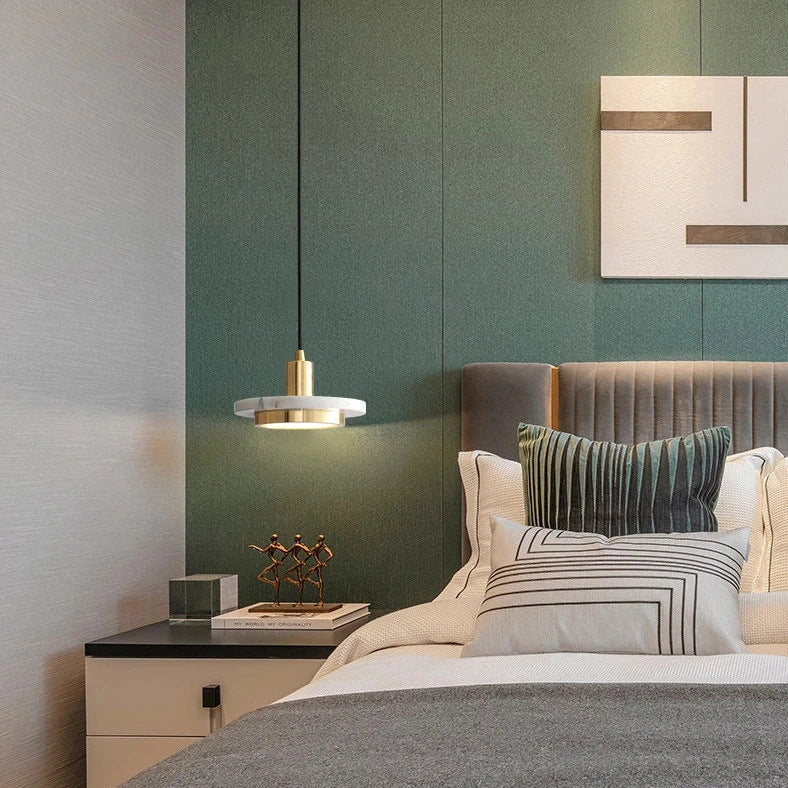 Nordic round marble chandelier with adjustable height suspended from ceiling