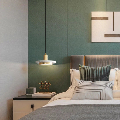 Nordic round marble chandelier with adjustable height suspended from ceiling