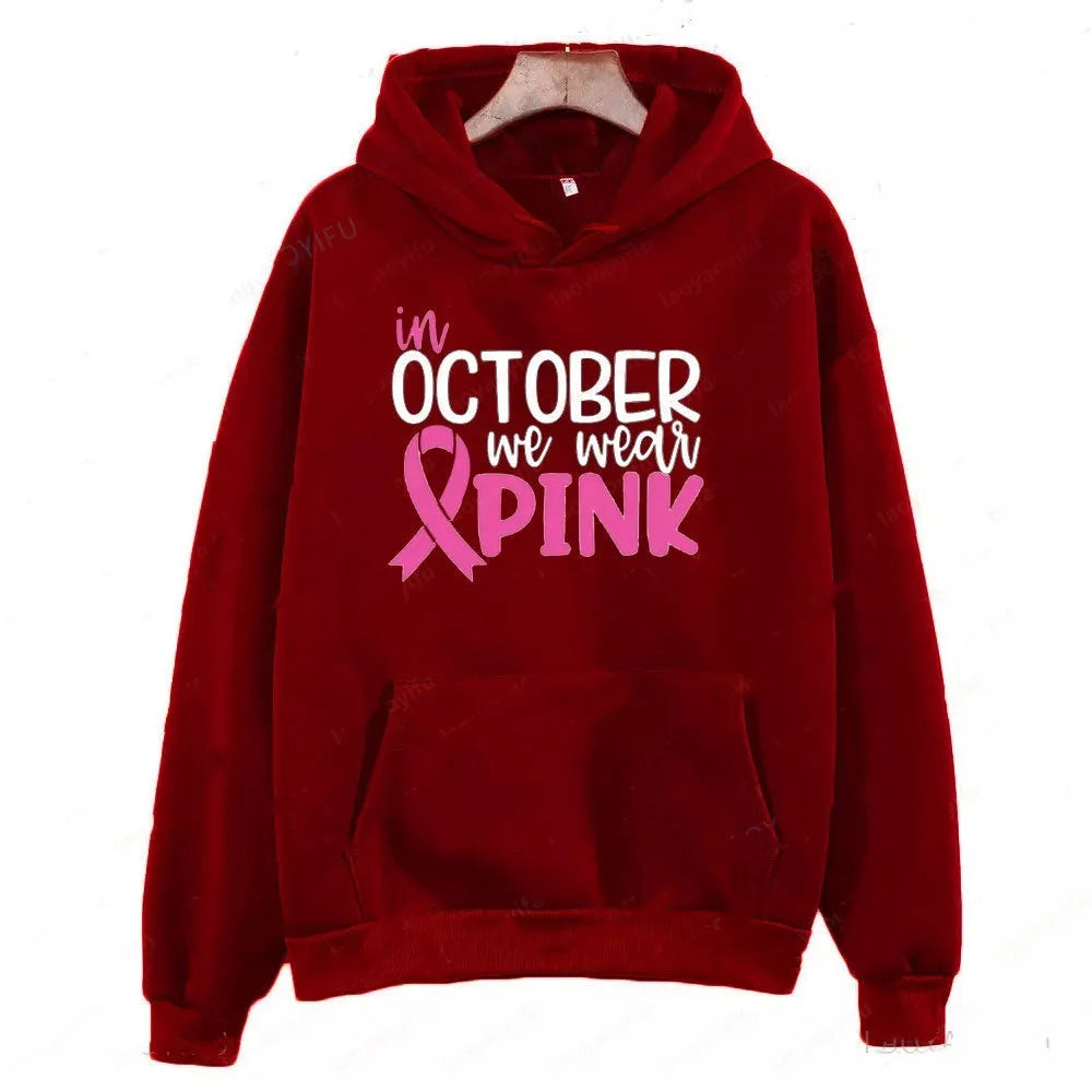 Art retro patterned pullover hoodie with a side seam pocket in a choice of colours.