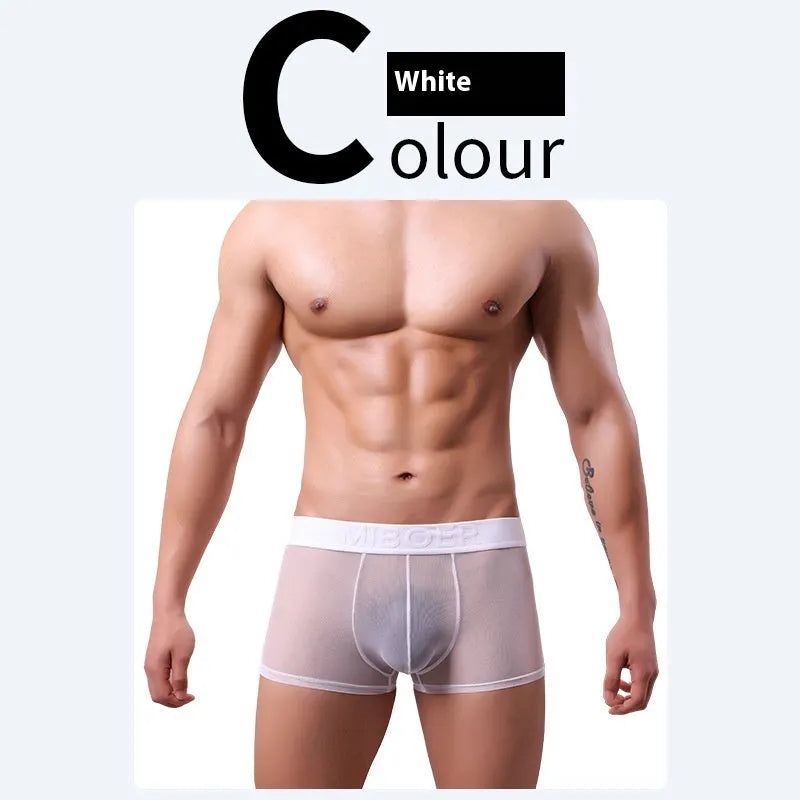 Men's thin knit boxer shorts in black, laid flat to show seamless design and waistband.