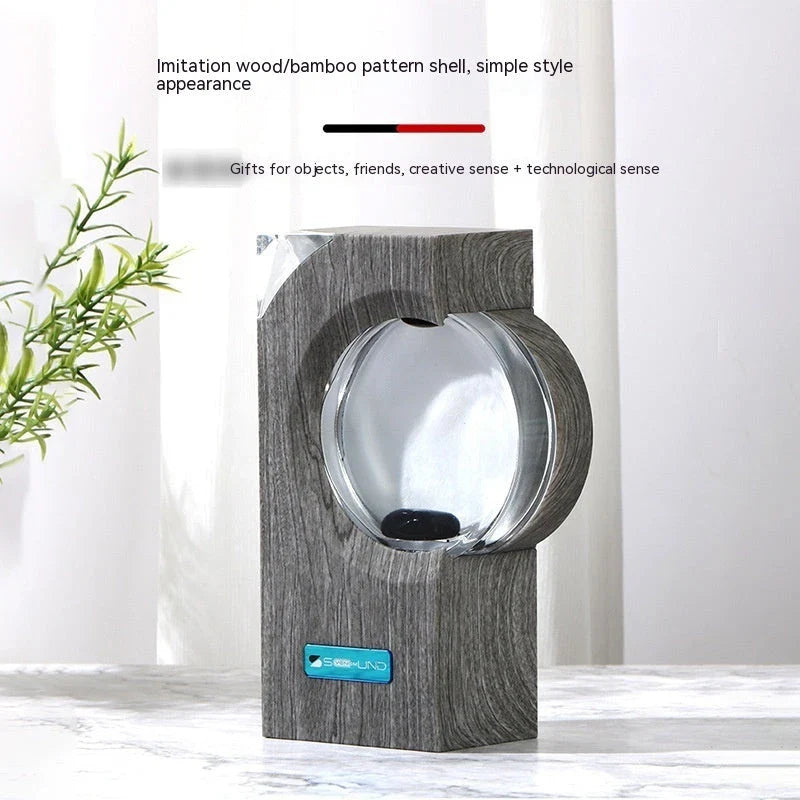 A magnetic fluid speaker that dances to the rhythm of music, creating a mesmerizing visual display