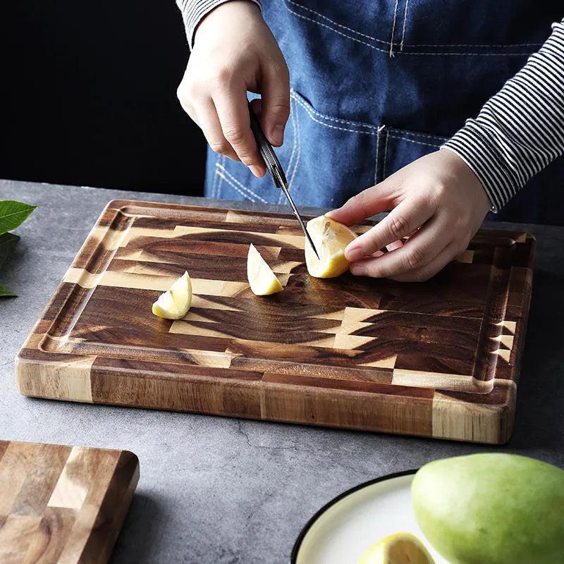 Brown solid acacia wood cutting board with 3cm thick edge, shown in large and small size options.