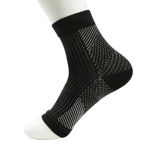 Anti-fatigue compression foot sleeves for men and women in black, red, and white