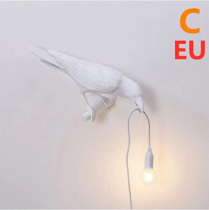 Elegant Resin Bird Wall Lamp illuminating a cozy room with its unique design