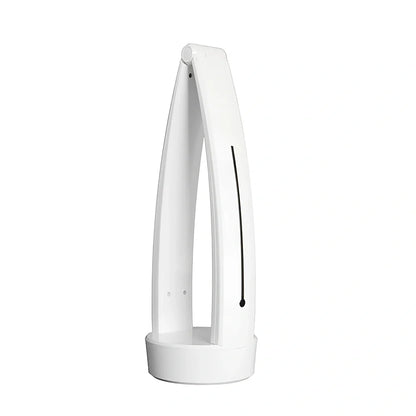 White folding LED desk lamp with touch control on wooden desk