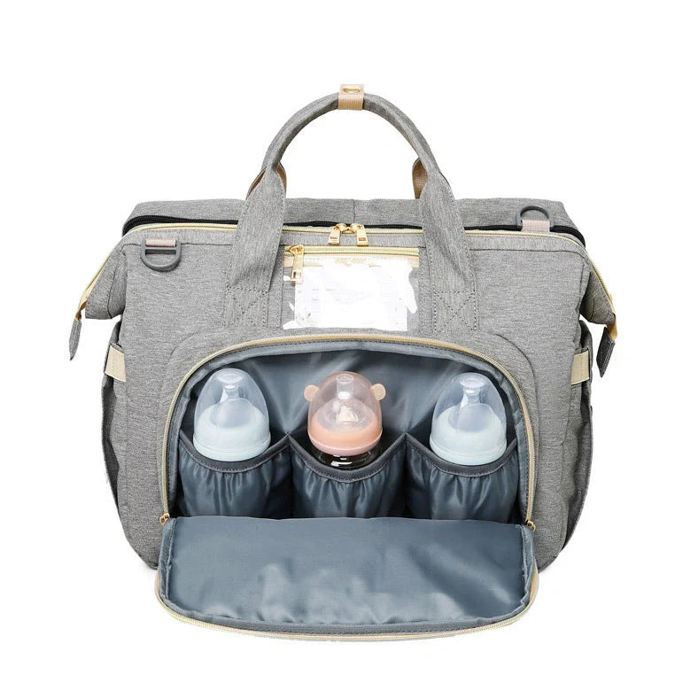 Portable folding crib mummy bag showing 40x19x32cm dimensions with Oxford cloth exterior