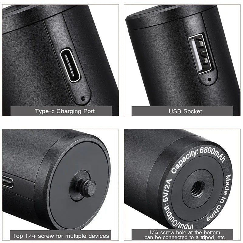 Black aluminium alloy portable power bank with an integrated carry handle, shown next to a smartphone for scale.