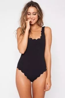 Black one-piece swimsuit with open back design, perfect for swimming and beach outings