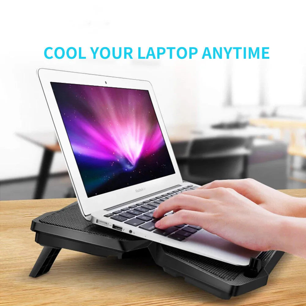 Blue laptop cooling base with four illuminated fans and USB ports for computer heat dissipation