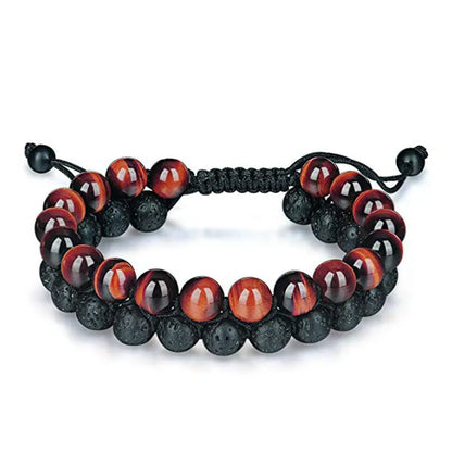 Tiger Eye and black agate geometric couple bracelets laid out as a matching set.