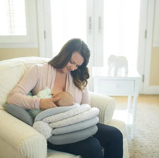 Adjustable breastfeeding pillow with soft, cloud-like filling and rectangular shape for customized comfort and support during feeding and bonding moments with your baby.