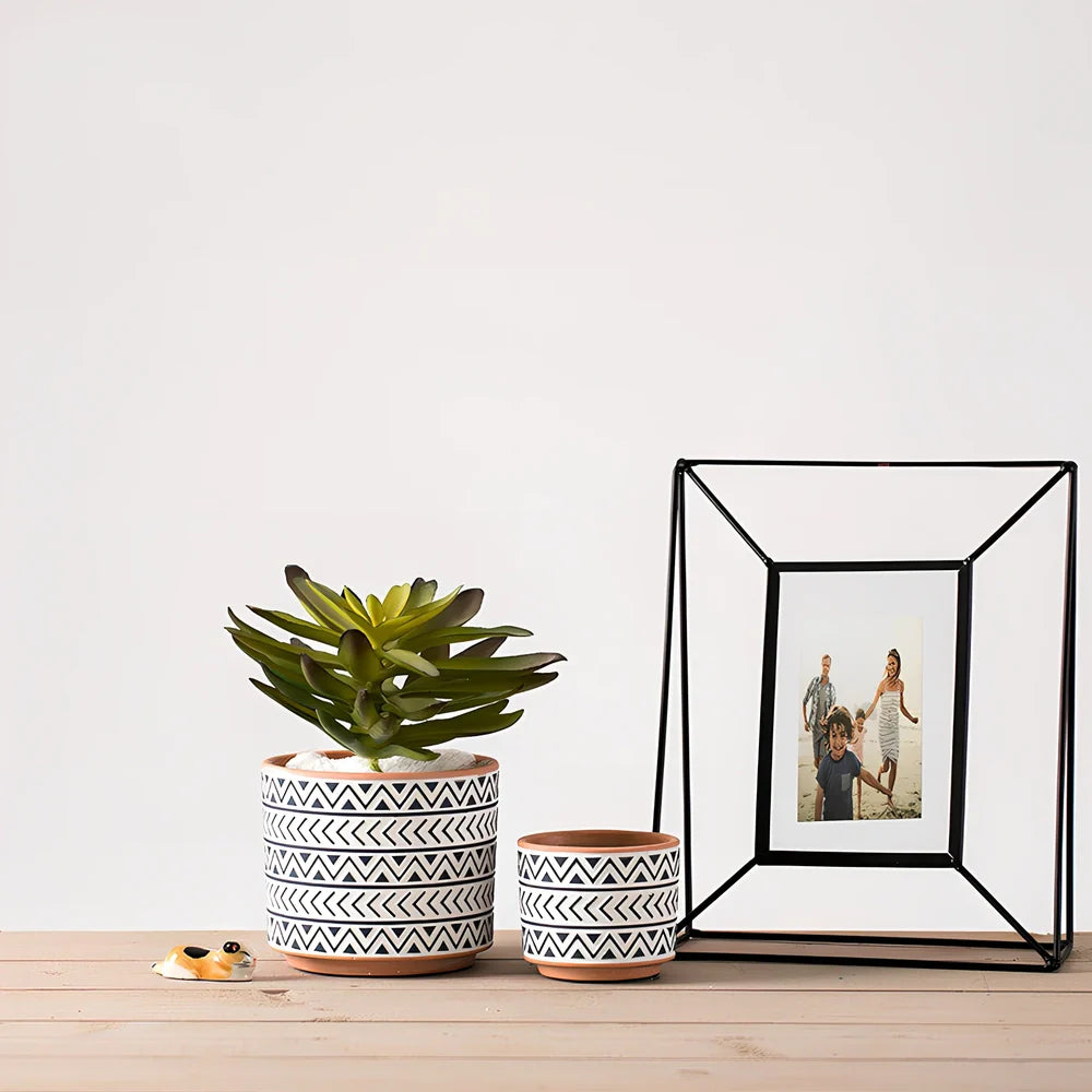 White ceramic geometric flower pot with Nordic design in three sizes for indoor plants