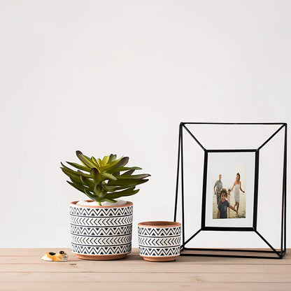 White ceramic geometric flower pot with Nordic design in three sizes for indoor plants