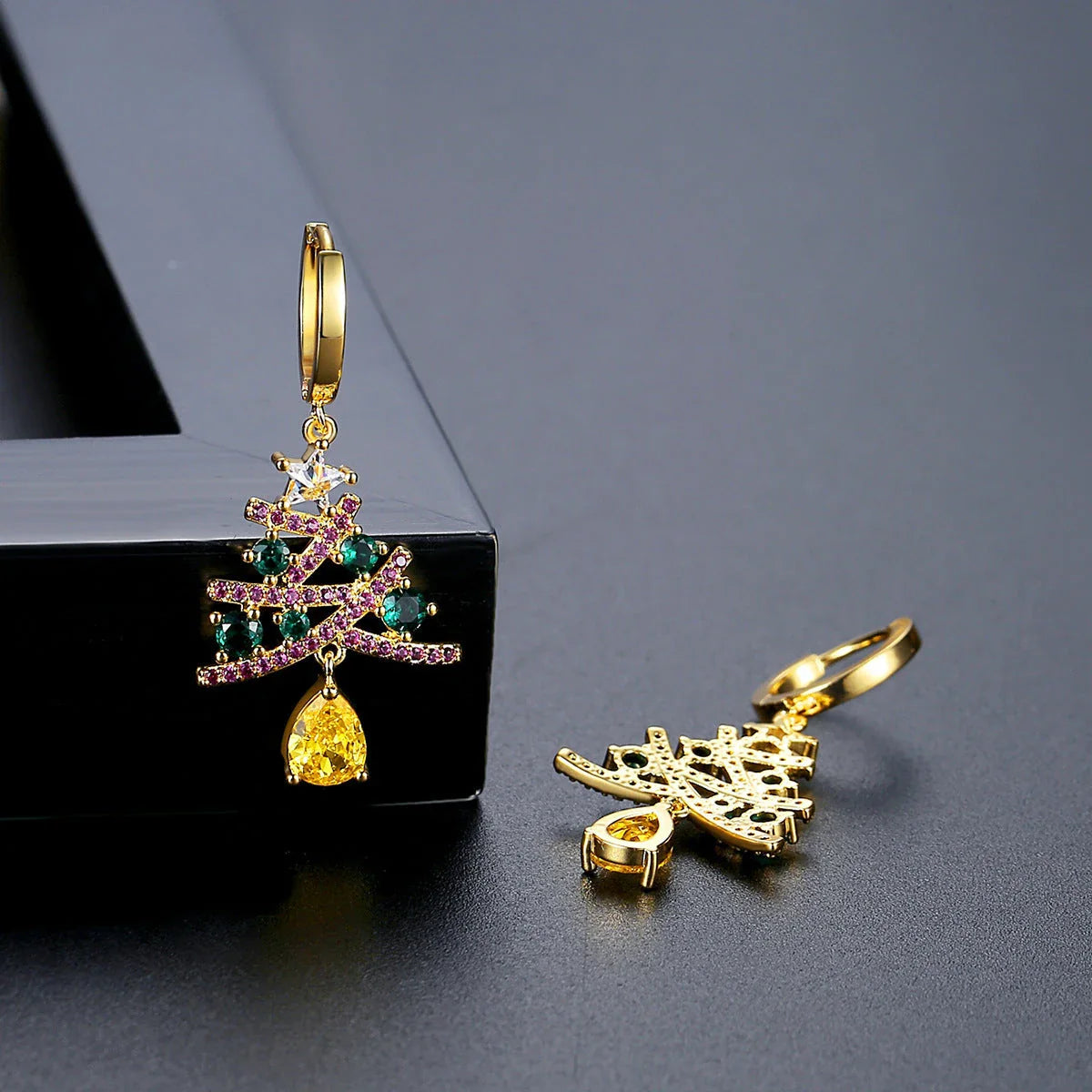 Elegant Christmas tree earrings with sparkling rhinestones, a festive holiday accessory for women