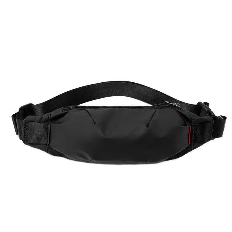 Black Oxford cloth waist pack measuring 12cm high by 27cm wide with crossbody strap and zipper closure