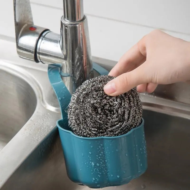 Nordic style plastic sink drain basket with draining compartment in blue, grey, or pink colour options.