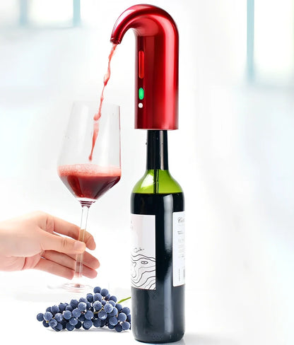 Black electronic wine aerator attached to red wine bottle, showing aeration pour in action, 24cm height device