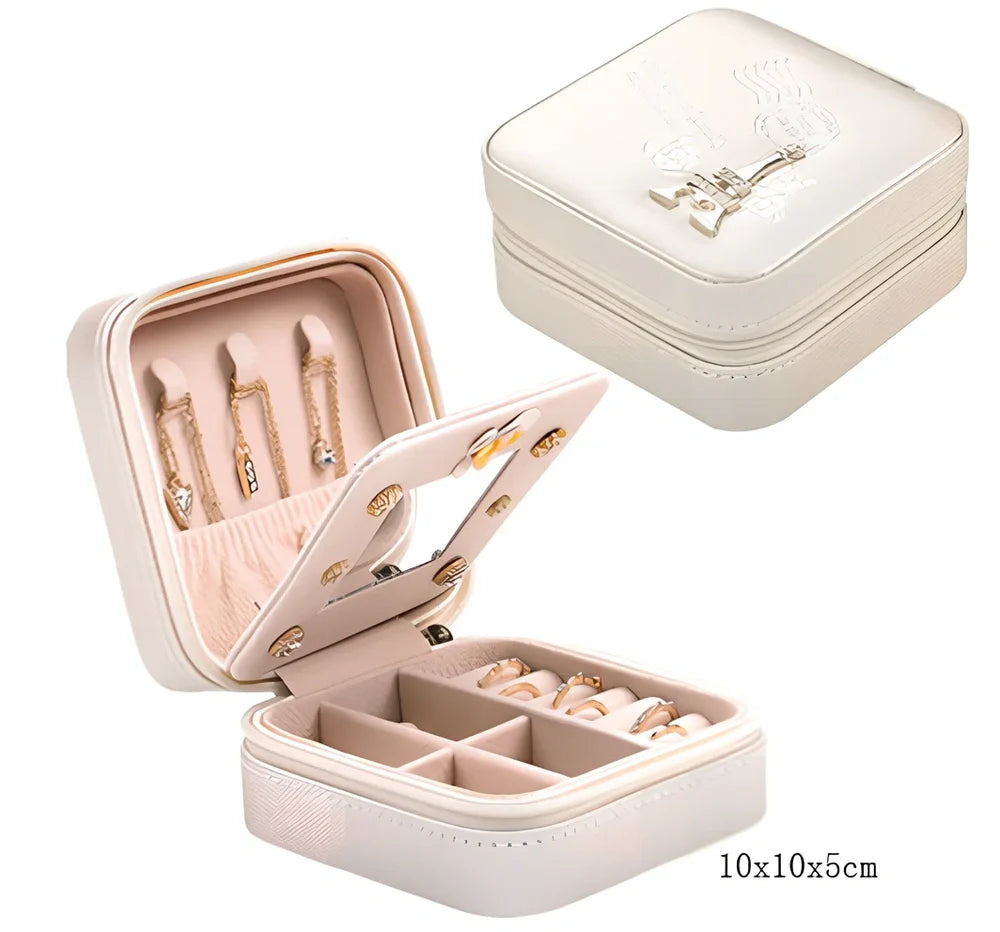 Three-layer travel jewellery box with PU leather exterior and secure closure for organised accessory storage
