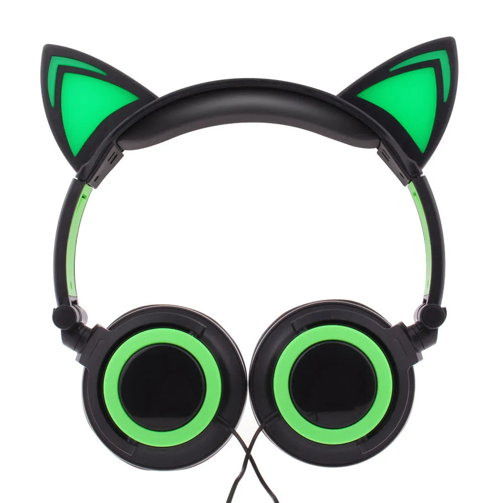 Colourful LED cat ear headphones with illuminated ears and cushions on a black background