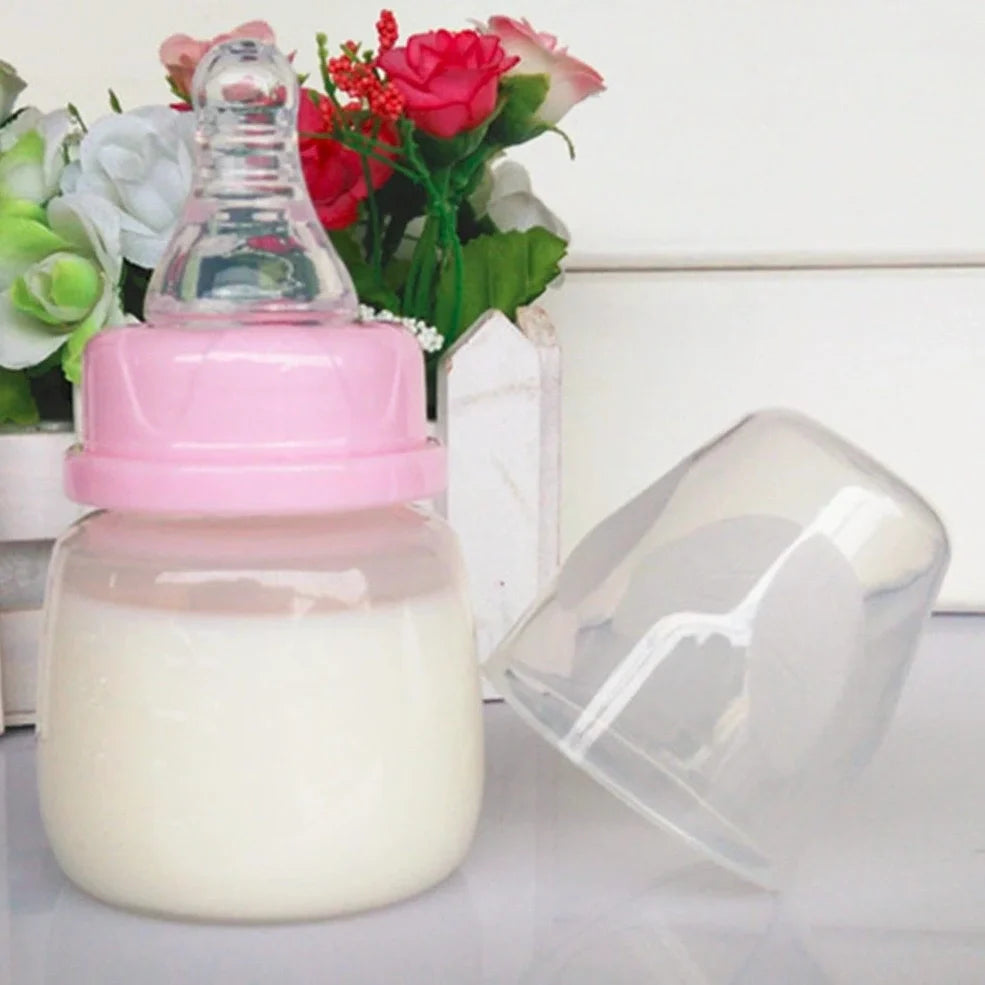 60ml infant feeding bottle with variable flow nipple in blue, green, or pink colour options