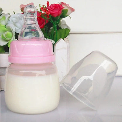 60ml infant feeding bottle with variable flow nipple in blue, green, or pink colour options