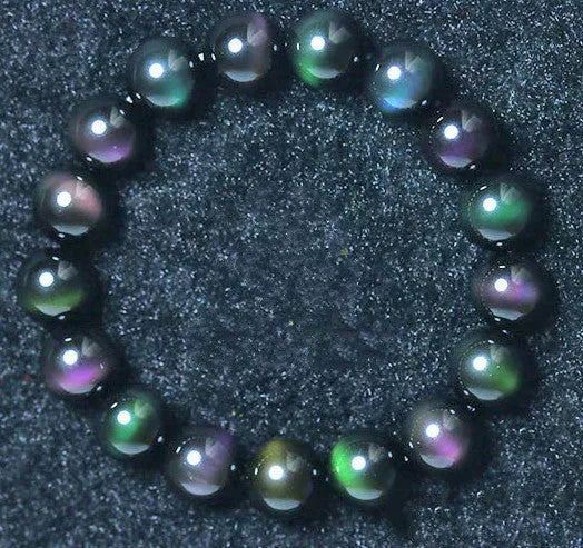 Rainbow Purple Green Eye Obsidian Bracelet with unique color blend and smooth stones