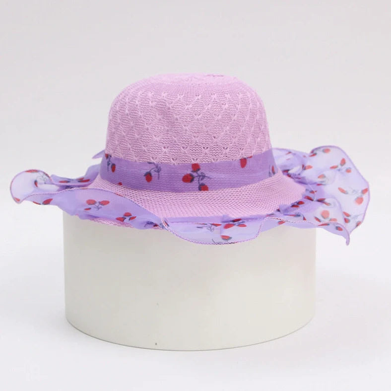 Children's princess straw hat with floral accents and wide brim for sun protection