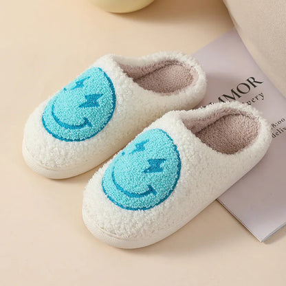 Women's plush home slippers in cartoon designs with a non-slip PVC sole.