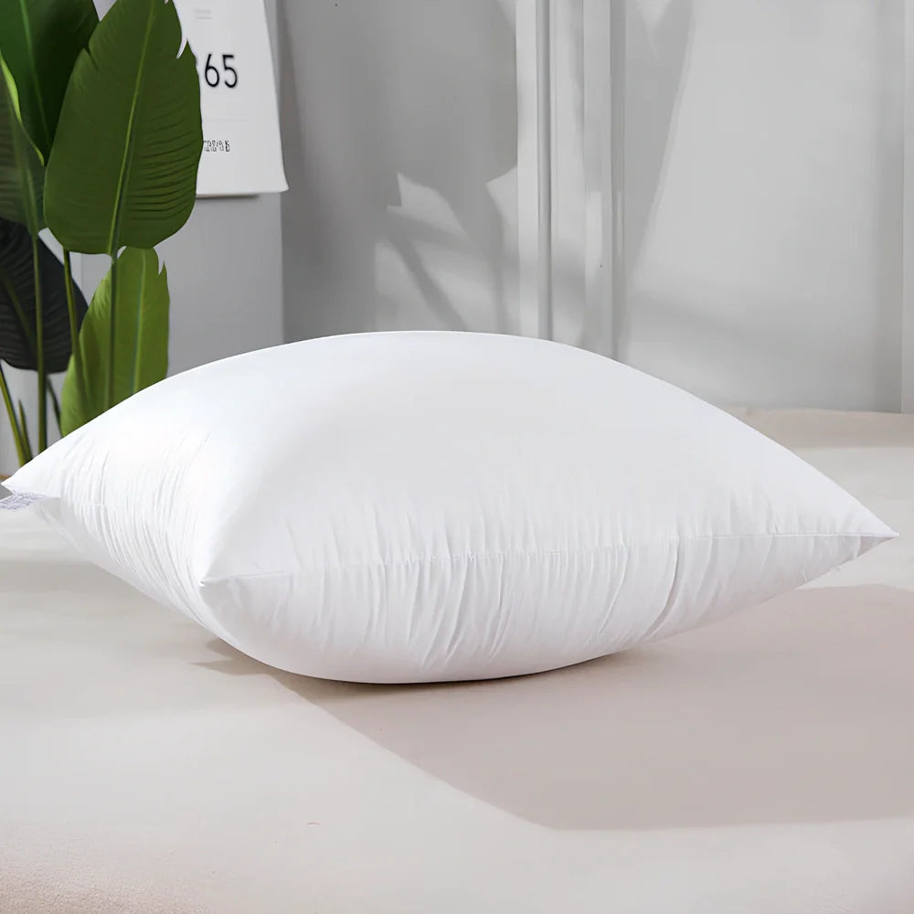 White cotton throw pillow with detachable cover in 18-inch square size with weather-resistant properties