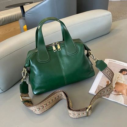 Soft pillow-shaped top grain leather handbag, 30cm x 13cm x 22cm, with double straps and inner patch pocket