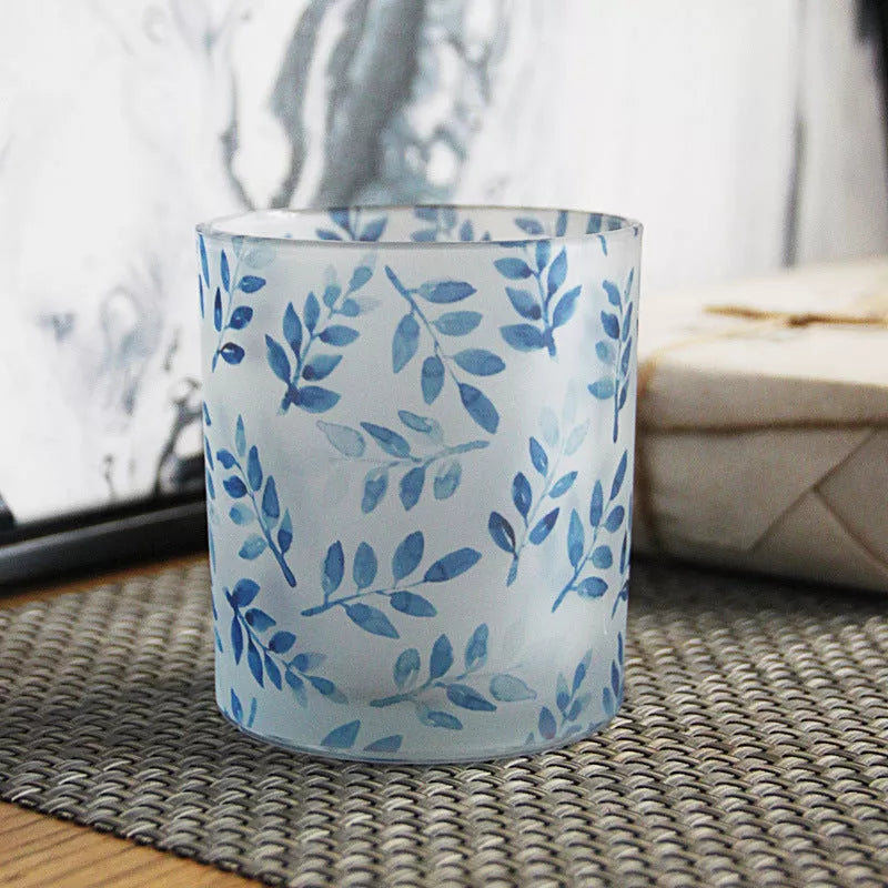 Mosaic glass candle holder in vibrant colors with elegant mosaic pattern