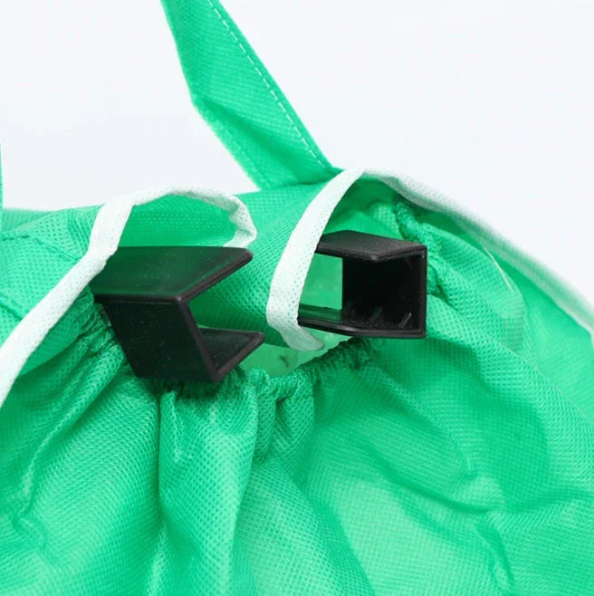 Foldable reusable grocery tote bag in green color, featuring durable construction, generous pockets, and a fold-flat design for easy storage