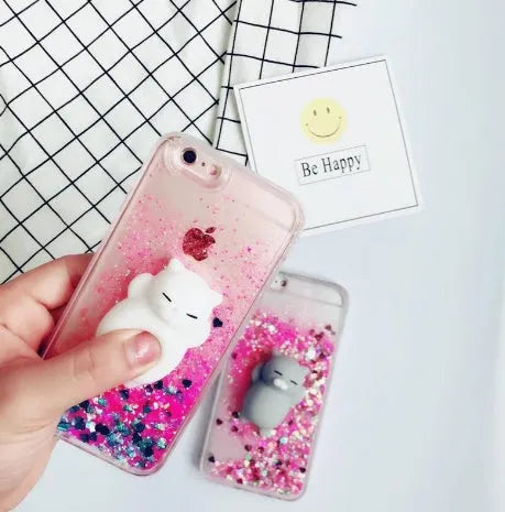 Cat phone case with glitter accents for iPhone, showing feline design and port cutouts