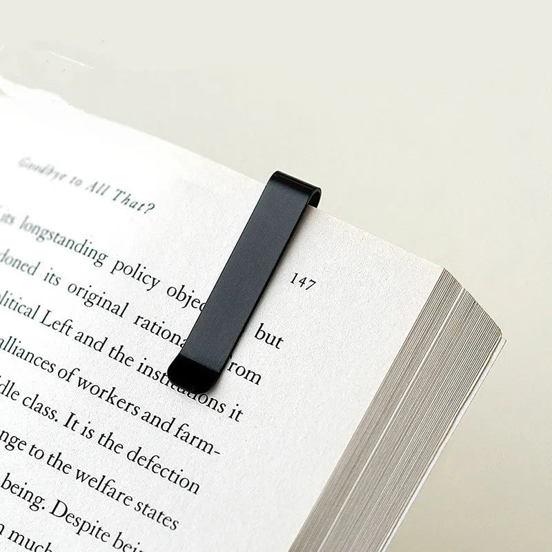 Aluminum bookmark ruler showing 15cm scale with laser-engraved markings in retro design