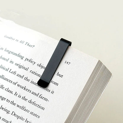 Aluminum bookmark ruler showing 15cm scale with laser-engraved markings in retro design