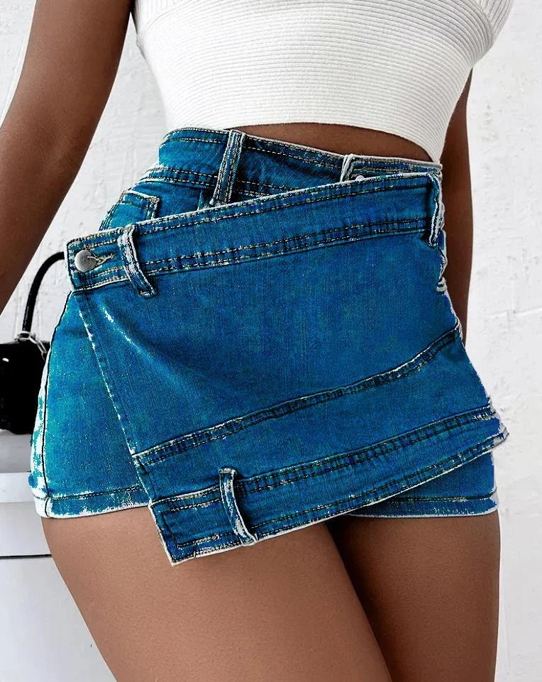 Stylish Y2K-inspired denim shorts with an asymmetrical hemline, high-waist design, and stretch fabric for a flattering fit