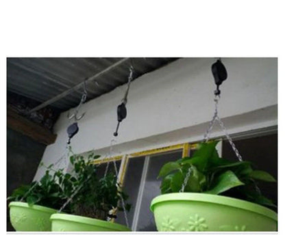 Adjustable hanging hook with pulley system for bird cages and baskets