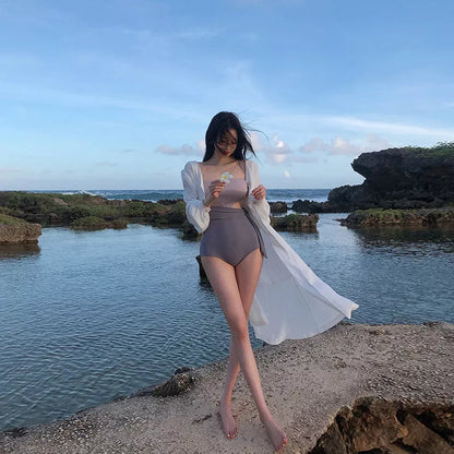 One-piece swimsuit in solid color with chest pad, sizes M, L, XL