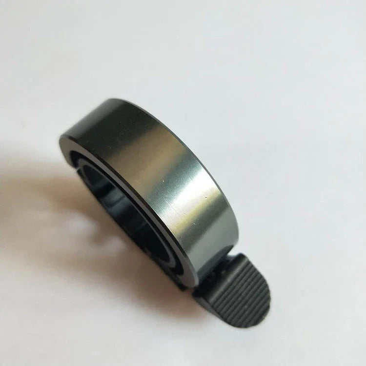 Sleek aluminum alloy bicycle bell with advanced sound alarm for safe cycling on mountain bikes and road bikes