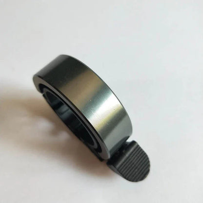 Sleek aluminum alloy bicycle bell with advanced sound alarm for safe cycling on mountain bikes and road bikes
