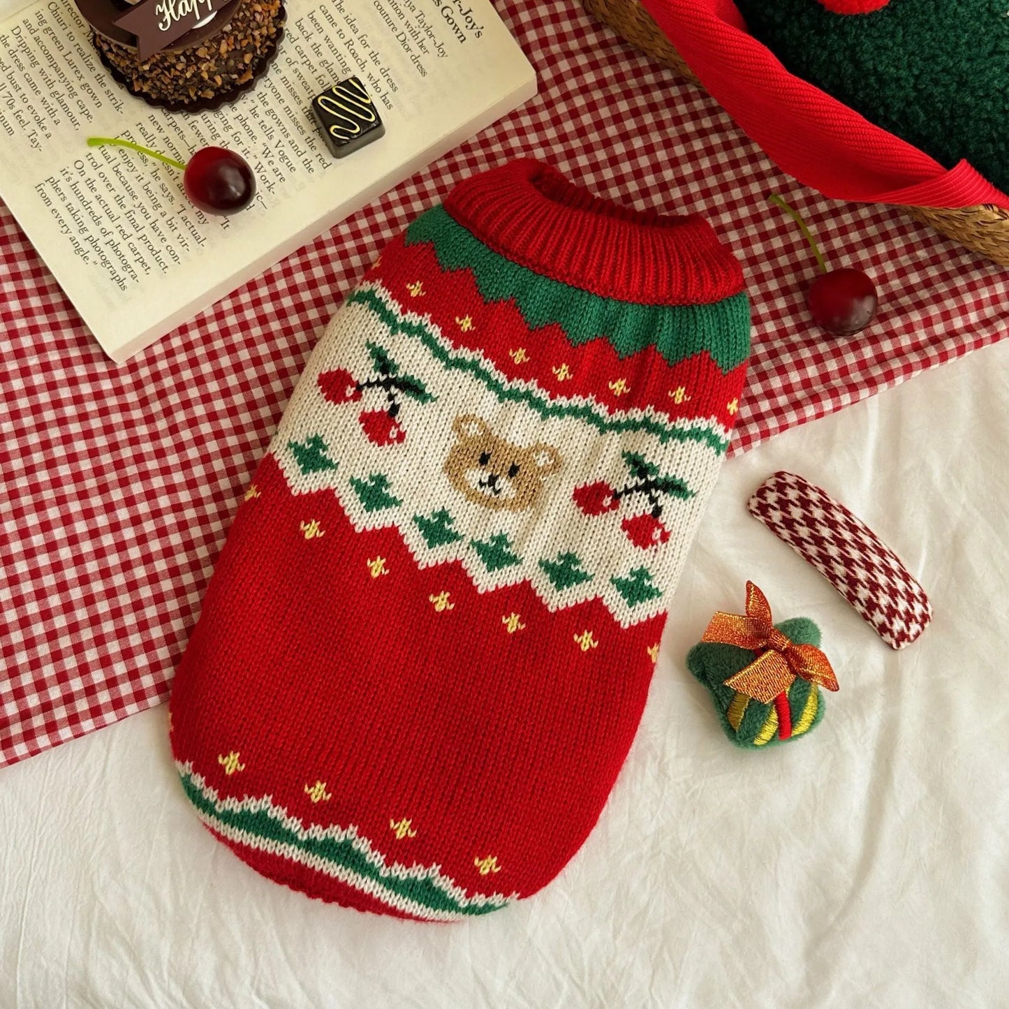 Red Christmas cherry pattern pet sweater for small to medium dogs and cats on mannequin