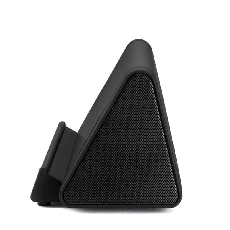 Small black wireless Bluetooth speaker for mobile phones and computers with charging cable