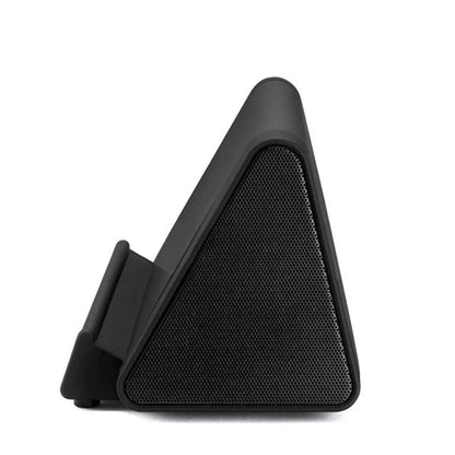 Small black wireless Bluetooth speaker for mobile phones and computers with charging cable