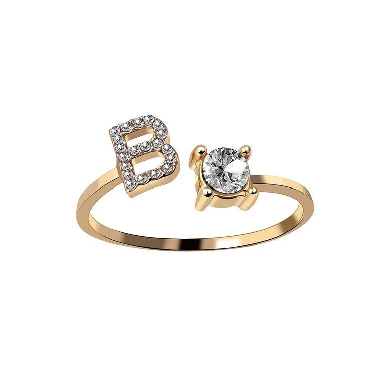 Personalized Initial Letter Adjustable Ring made of copper alloy and zircon, showcasing a vintage-inspired design