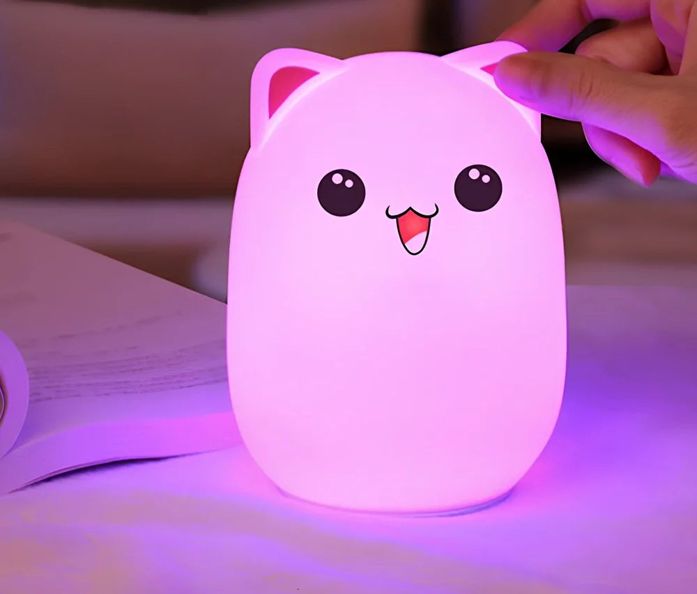 Cartoon silicone night lamp with clap activation in blue or pink, dimensions 100x100x135mm