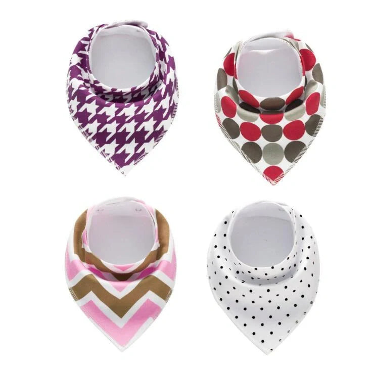 Stylish baby bibs and burp cloths featuring trendy arrow, wave, and triangle designs in soft, absorbent cotton