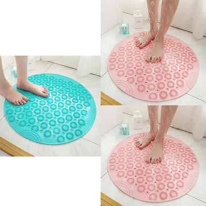 Textured round shower mat with anti-slip surface, massage nodules, and drainage holes for a comfortable and safe bathing experience