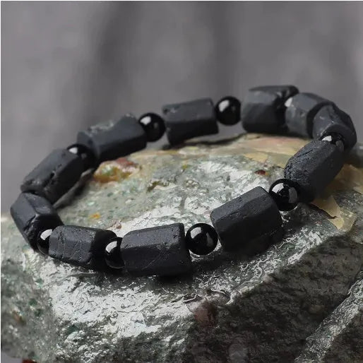 Natural black tourmaline rough stone bracelet with stretch cord on wrist